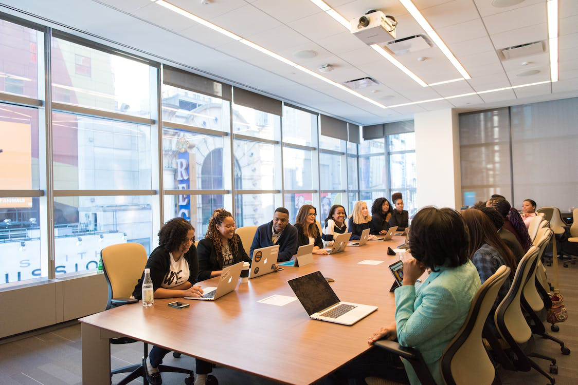 A group of people in a conference room