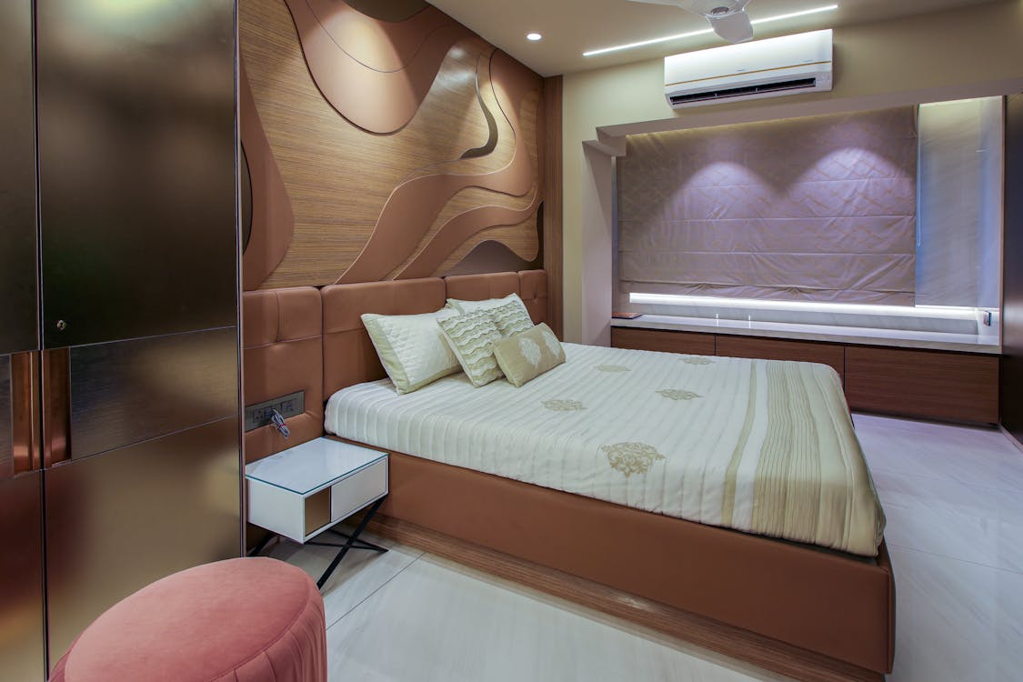 An image of a bedroom with an AC